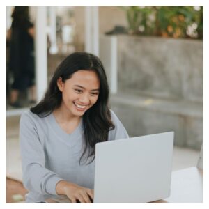 woman studying at laptop