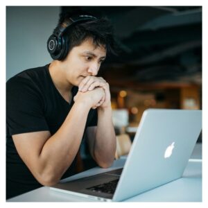 man learning at computer