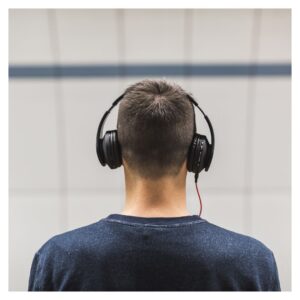 man listening to headphones