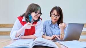 student and teacher practicing language