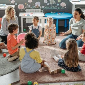 kids in class with teachers