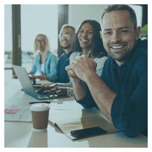 smiling employees in workplace